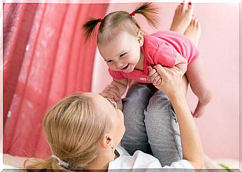 mother playing with her daughter