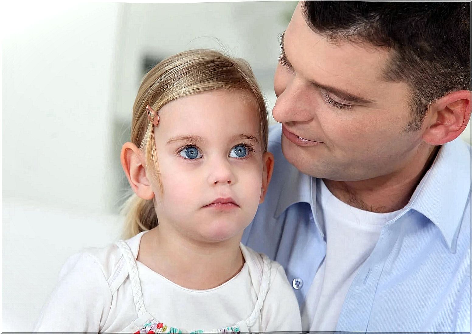 Father exercising exaggerated protection with his daughter.