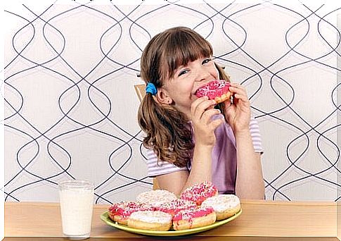 girl eating donut