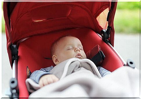 baby sleeping in the stroller